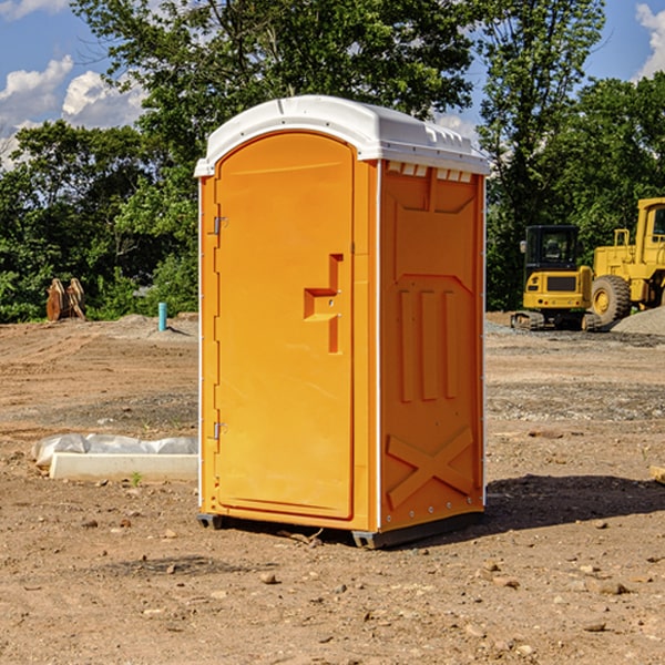 what is the cost difference between standard and deluxe portable restroom rentals in Highland OH